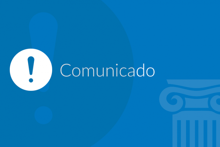 Imagem de plano de fundo azul com texto na cor branca escrito comunicado e simbolo de exclamação